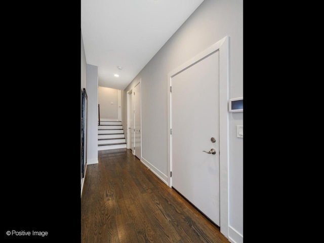 corridor with recessed lighting and dark wood-style floors