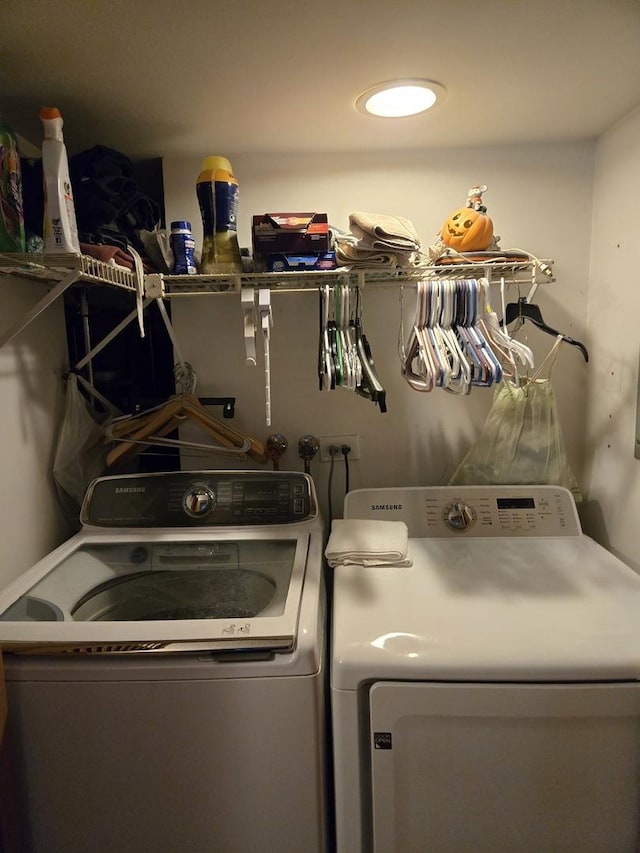 laundry area featuring laundry area and separate washer and dryer