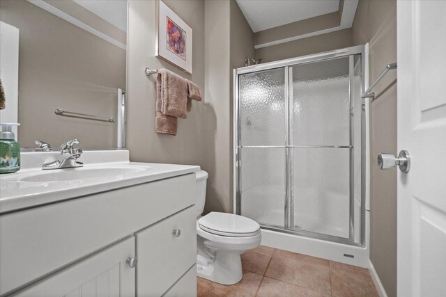 1721 Partridge Pt, Normal, IL 61761 - full bath with a stall shower, toilet, tile patterned flooring, and vanity