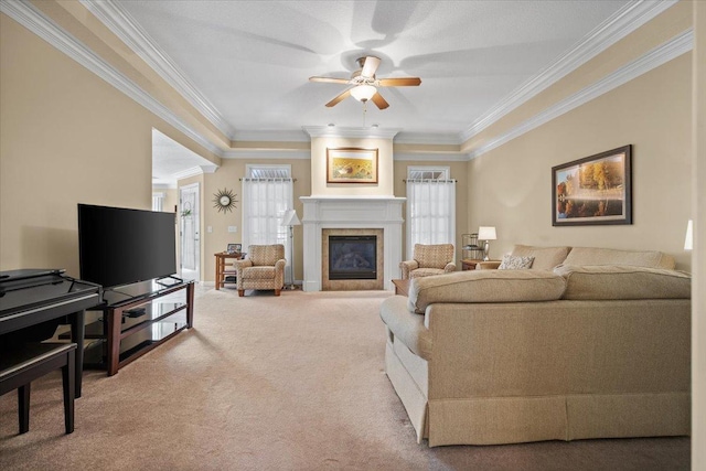 1721 Partridge Pt, Normal, IL 61761 - carpeted living area featuring crown molding, a ceiling fan, and a glass covered fireplace