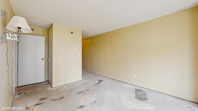 111 W Maple St Unit 1001, Chicago, IL 60610 - unfurnished room featuring a textured ceiling