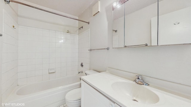 111 W Maple St Unit 1001, Chicago, IL 60610 - full bath featuring toilet,  shower combination, vanity, and a textured ceiling