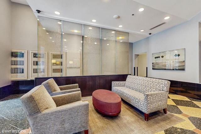 111 W Maple St Unit 1001, Chicago, IL 60610 - building lobby featuring recessed lighting and a surveillance system
