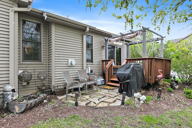 back of property featuring a deck