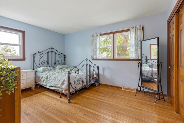 19 S 11th St, Saint Charles, IL 60174 - bedroom with light wood finished floors, a closet, and baseboards