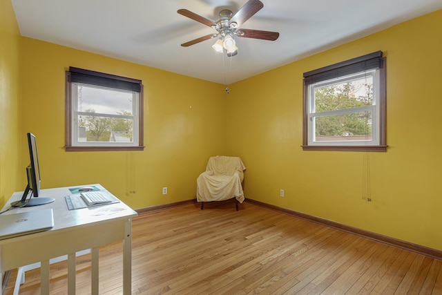 19 S 11th St, Saint Charles, IL 60174 - unfurnished office with light wood-type flooring, a ceiling fan, and baseboards