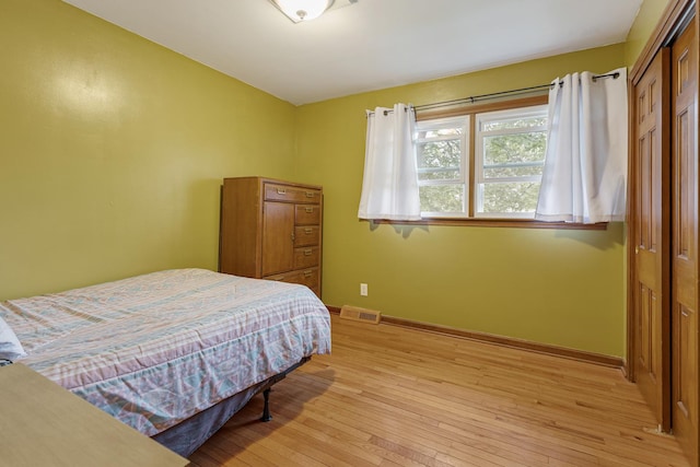 19 S 11th St, Saint Charles, IL 60174 - bedroom with light wood-type flooring, a closet, and baseboards