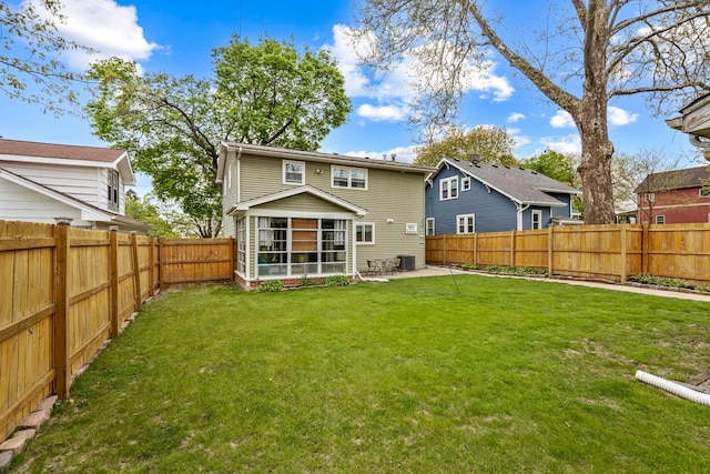 19 S 11th St, Saint Charles, IL 60174 - rear view of house featuring a sunroom, a patio area, and central AC unit