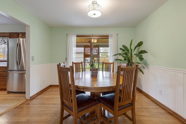 19 S 11th St, Saint Charles, IL 60174 - dining space with light wood-type flooring and wainscoting