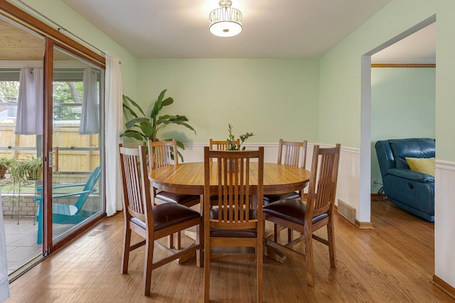19 S 11th St, Saint Charles, IL 60174 - dining space featuring light wood-style floors and wainscoting
