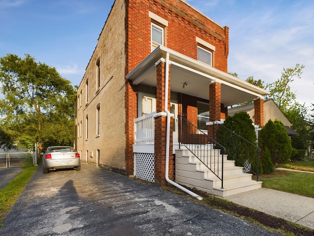 625 Ingraham Ave, Calumet City, IL 60409 - view of front of home with a porch and brick siding