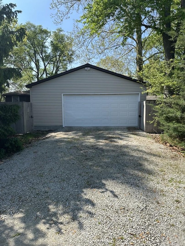 detached garage with fence