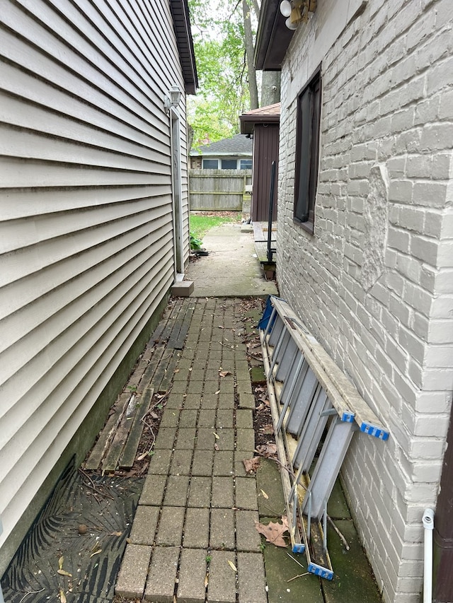 view of side of property with fence