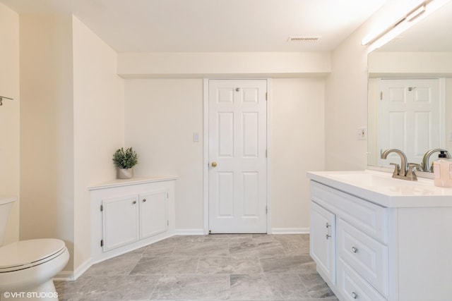 6361 Patricia Dr, Matteson, IL 60443 - bathroom featuring vanity, toilet, and baseboards