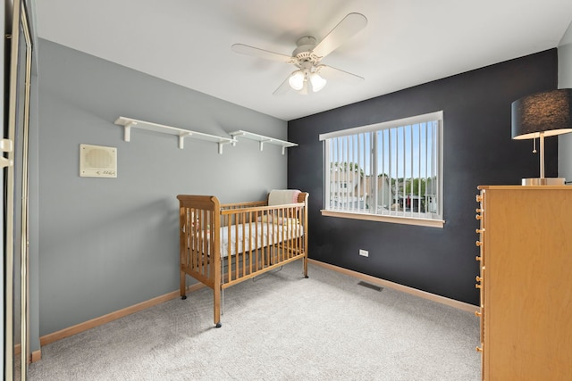 2013 Graystone Dr, Joliet, IL 60431 - bedroom featuring carpet floors, a nursery area, baseboards, and ceiling fan