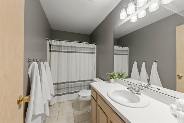 2013 Graystone Dr, Joliet, IL 60431 - bathroom with toilet, vanity, tile patterned flooring, and curtained shower