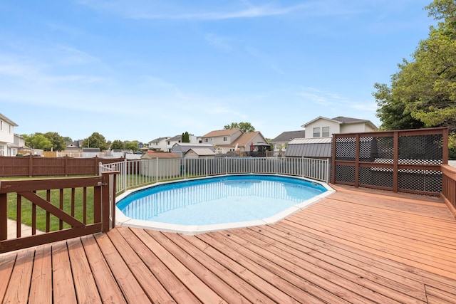 2013 Graystone Dr, Joliet, IL 60431 - view of pool with a wooden deck, a fenced backyard, and a residential view
