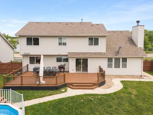 2013 Graystone Dr, Joliet, IL 60431 - back of house featuring a deck, a chimney, and a shingled roof