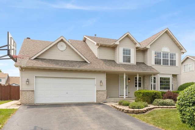 2013 Graystone Dr, Joliet, IL 60431 - traditional-style home with brick siding, asphalt driveway, roof with shingles, and a garage