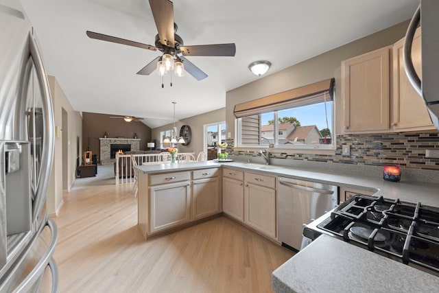 2013 Graystone Dr, Joliet, IL 60431 - kitchen with appliances with stainless steel finishes, light wood-type flooring, a sink, ceiling fan, and lofted ceiling