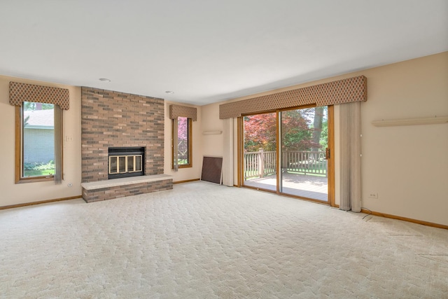 9228 Ridgeland Ave, Oak Lawn, IL 60453 - unfurnished living room featuring plenty of natural light, carpet flooring, and a brick fireplace