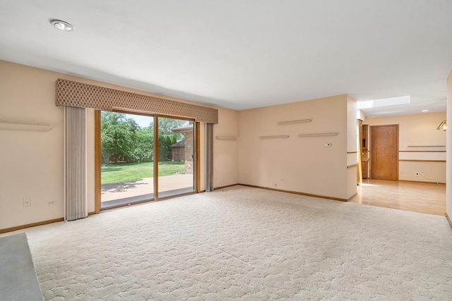 9228 Ridgeland Ave, Oak Lawn, IL 60453 - unfurnished living room with light colored carpet and baseboards