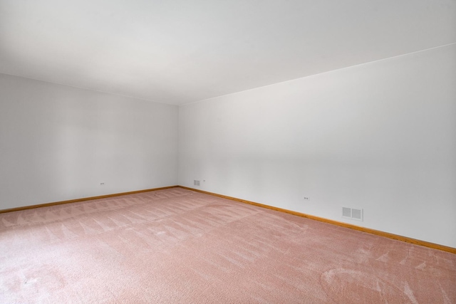 9228 Ridgeland Ave, Oak Lawn, IL 60453 - spare room with light carpet and baseboards