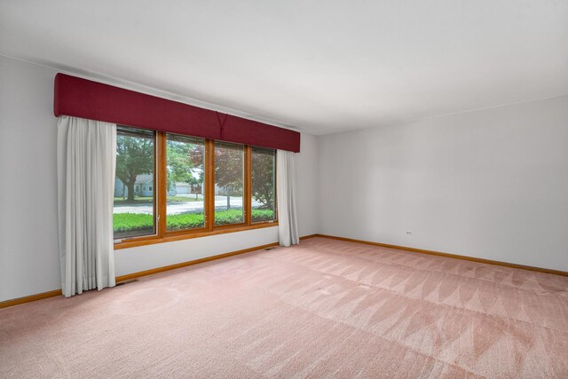 9228 Ridgeland Ave, Oak Lawn, IL 60453 - carpeted spare room featuring baseboards
