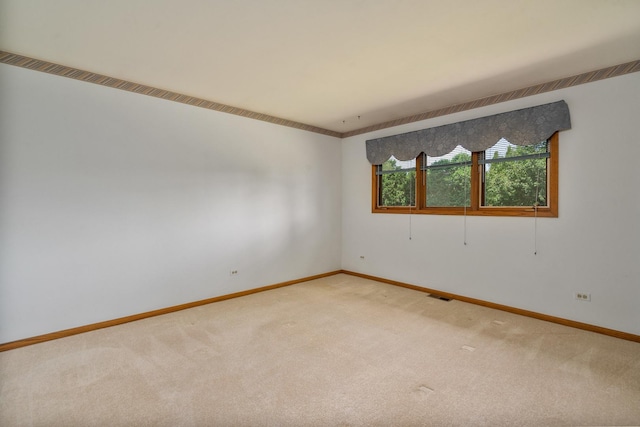 9228 Ridgeland Ave, Oak Lawn, IL 60453 - spare room featuring light colored carpet and baseboards