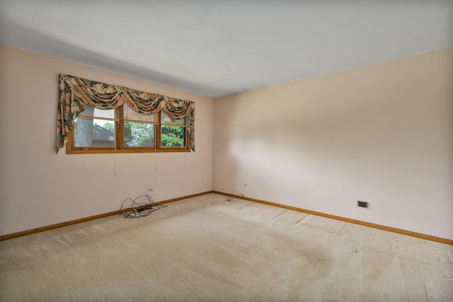 9228 Ridgeland Ave, Oak Lawn, IL 60453 - unfurnished room with baseboards and light carpet
