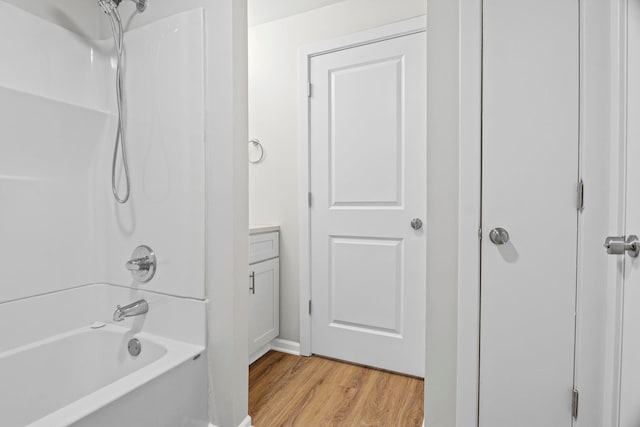 764 Terrace Ct Unit A, Elgin, IL 60120 - bathroom featuring wood finished floors and shower / tub combination