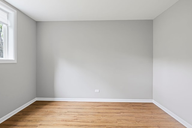 764 Terrace Ct Unit A, Elgin, IL 60120 - unfurnished room with light wood-style floors and baseboards