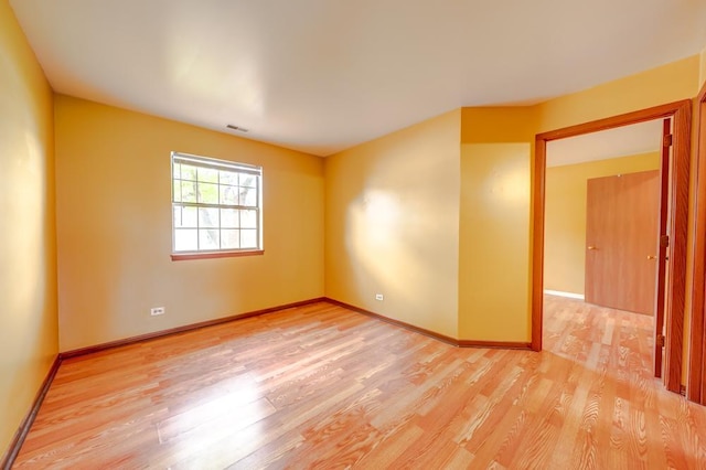 99 Gant Cir Unit C, Streamwood, IL 60107 - unfurnished room featuring visible vents, light wood-style flooring, and baseboards