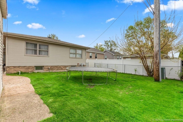 17800 Ridgeland Ave, Tinley Park, IL 60477 - rear view of property featuring a yard, fence, and a trampoline