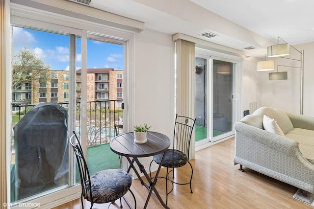 balcony with visible vents and a grill