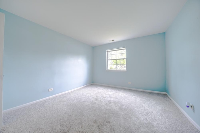 109 Gant Cir Unit B, Streamwood, IL 60107 - carpeted spare room with visible vents and baseboards