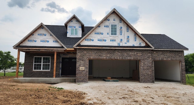 24415 W Quail Dr, Channahon, IL 60410 - property under construction with brick siding, a shingled roof, driveway, and an attached garage
