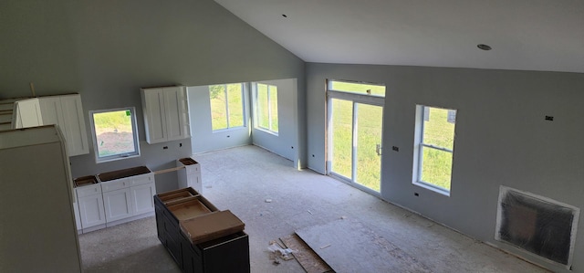 24415 W Quail Dr, Channahon, IL 60410 - unfurnished living room featuring high vaulted ceiling