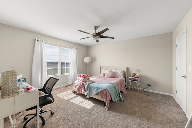 8529 Sawyer Ct, Joliet, IL 60431 - carpeted bedroom featuring a desk, baseboards, and ceiling fan