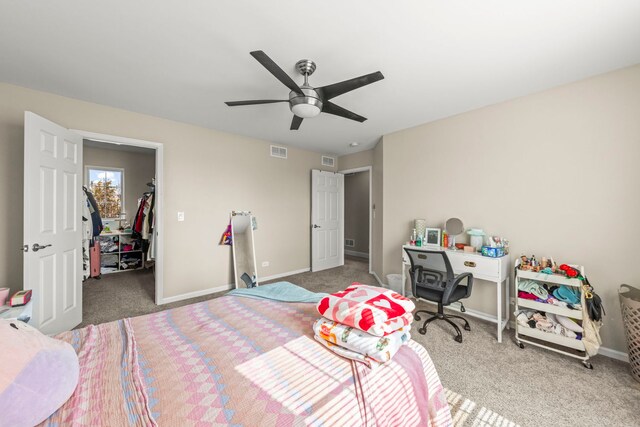 8529 Sawyer Ct, Joliet, IL 60431 - bedroom featuring carpet floors, baseboards, and a walk in closet