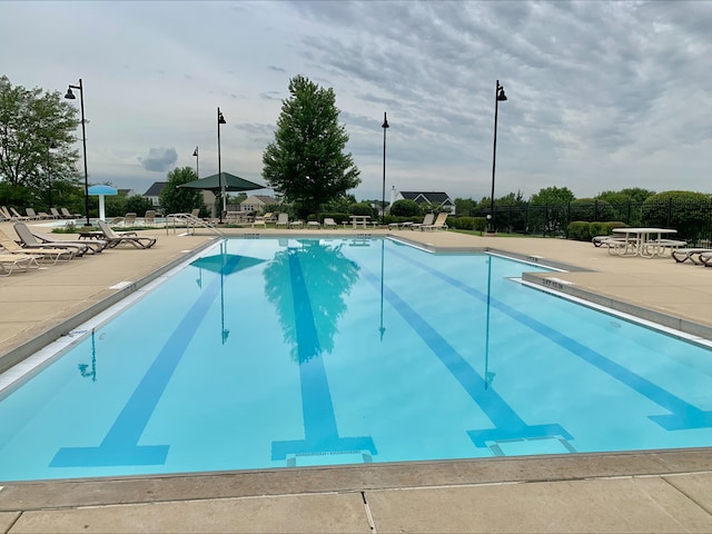8529 Sawyer Ct, Joliet, IL 60431 - community pool with a patio area and fence