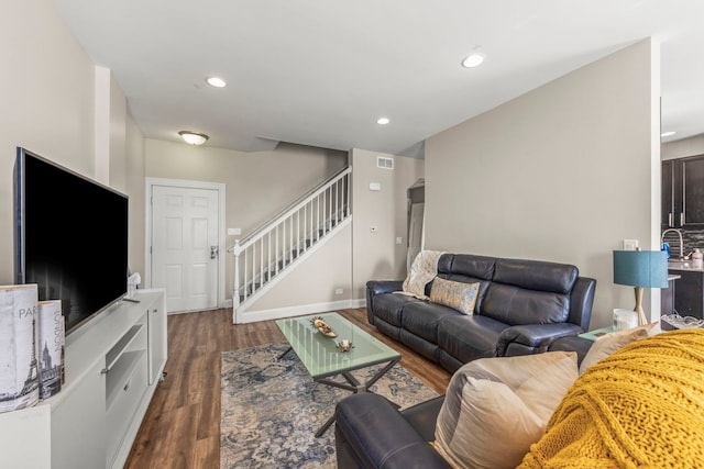 8529 Sawyer Ct, Joliet, IL 60431 - living room featuring stairs, wood finished floors, and recessed lighting