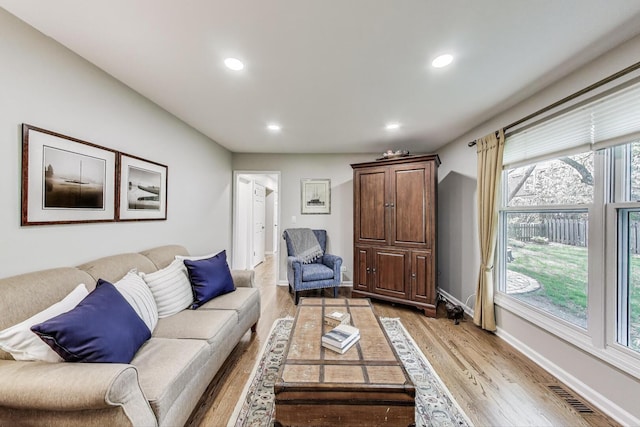 962 Thompson Blvd, Buffalo Grove, IL 60089 - living room with light wood finished floors, recessed lighting, and baseboards