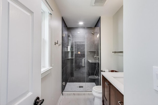 962 Thompson Blvd, Buffalo Grove, IL 60089 - full bath featuring toilet, marble finish flooring, a shower stall, baseboards, and vanity