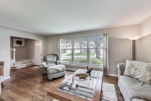 962 Thompson Blvd, Buffalo Grove, IL 60089 - living area featuring stairway, wood finished floors, and baseboards