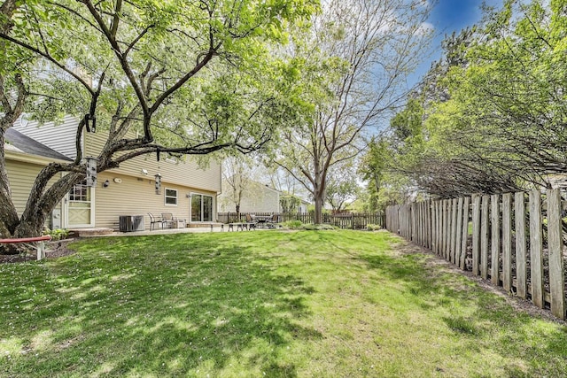 962 Thompson Blvd, Buffalo Grove, IL 60089 - view of yard with central air condition unit and a patio