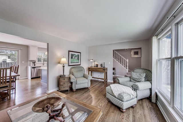 962 Thompson Blvd, Buffalo Grove, IL 60089 - living area with stairs, wood finished floors, and baseboards