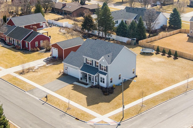 birds eye view of property with a residential view