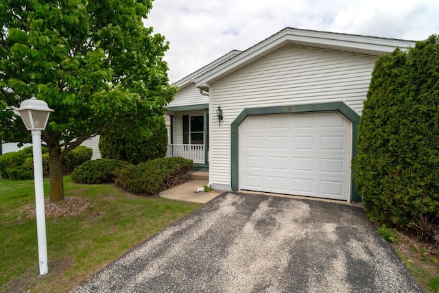 3404 Steeplechase Way, Grayslake, IL 60030 - ranch-style house with a porch, a garage, driveway, and a front yard