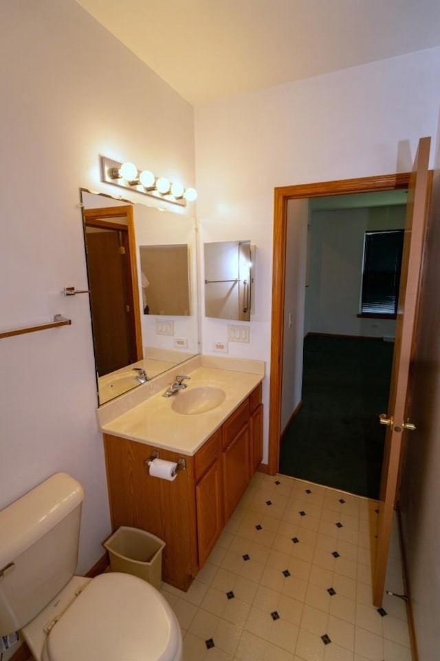 3404 Steeplechase Way, Grayslake, IL 60030 - half bathroom featuring toilet, vanity, and tile patterned floors